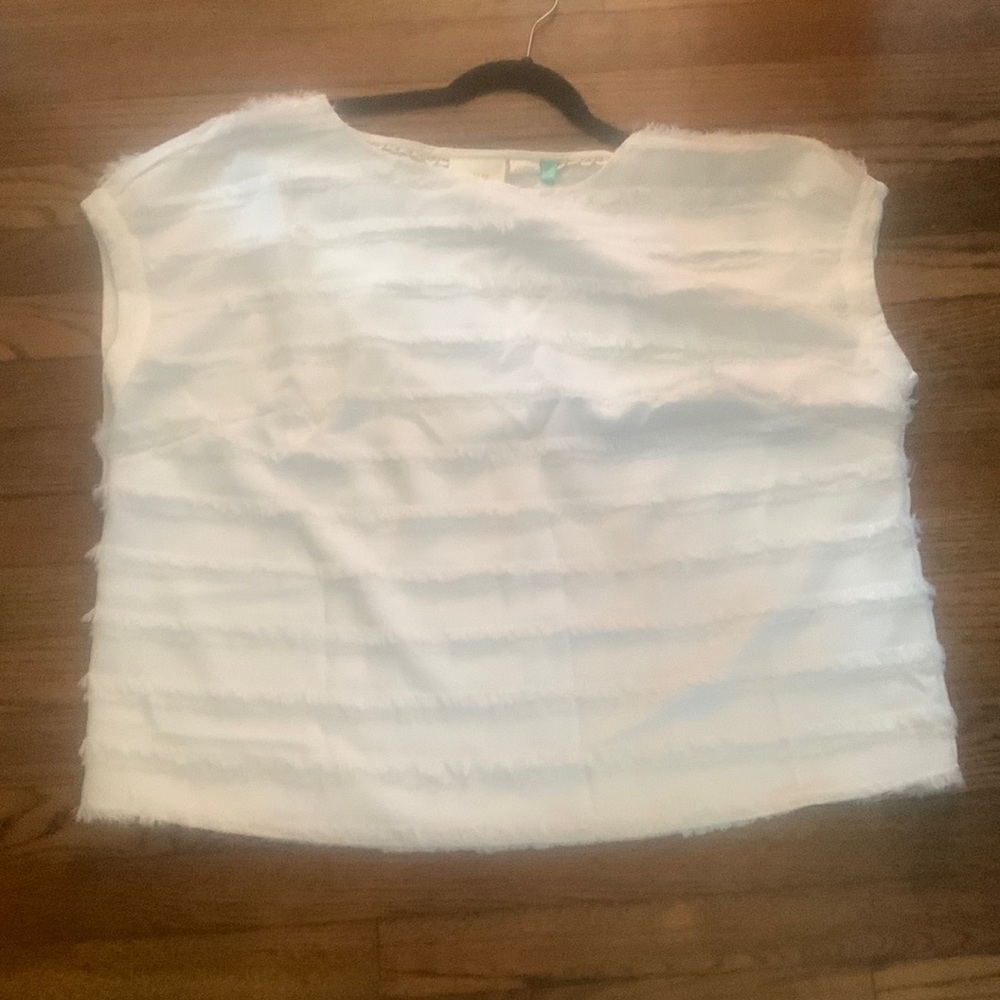 White ruffled women’s shirt